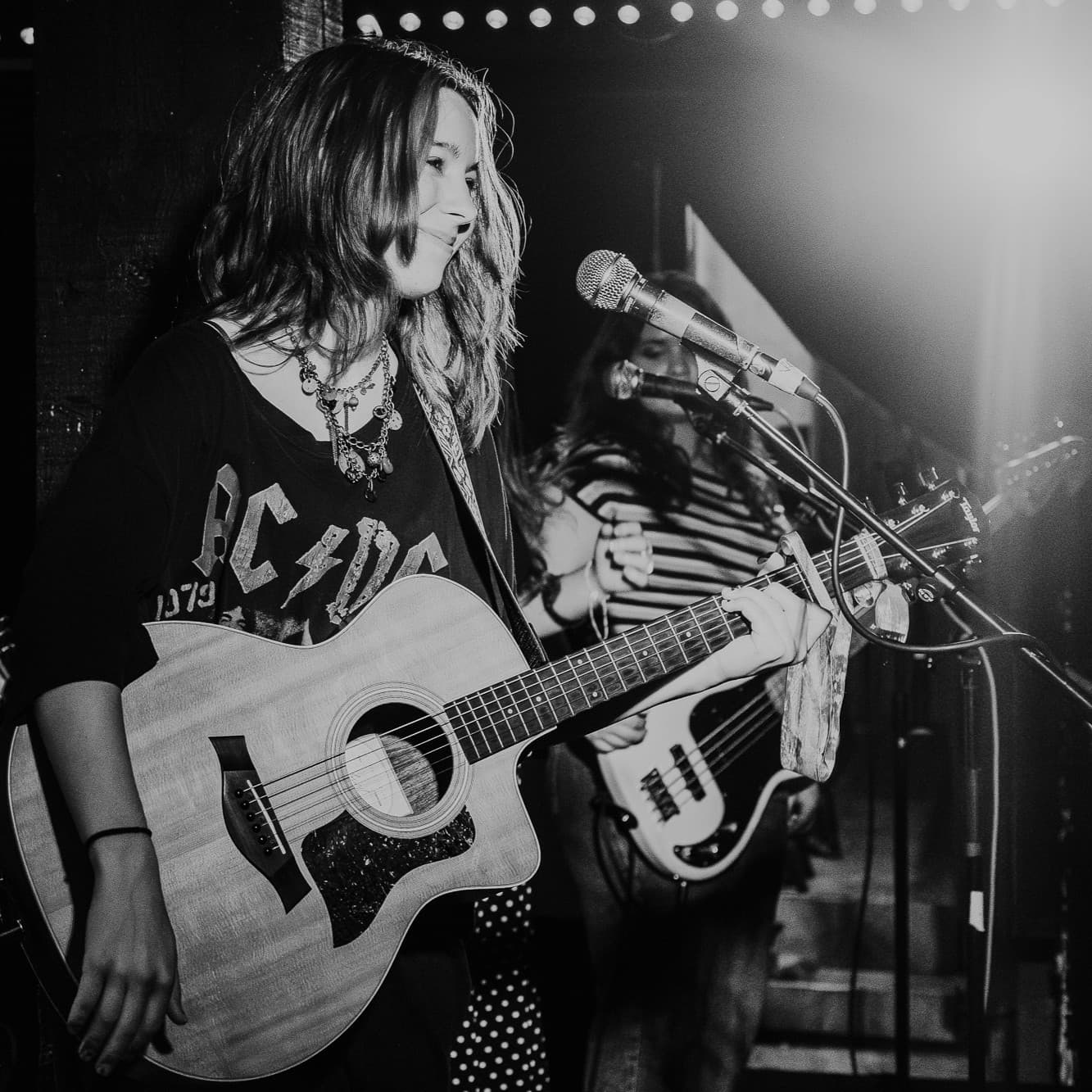 Maddy Low performing on stage